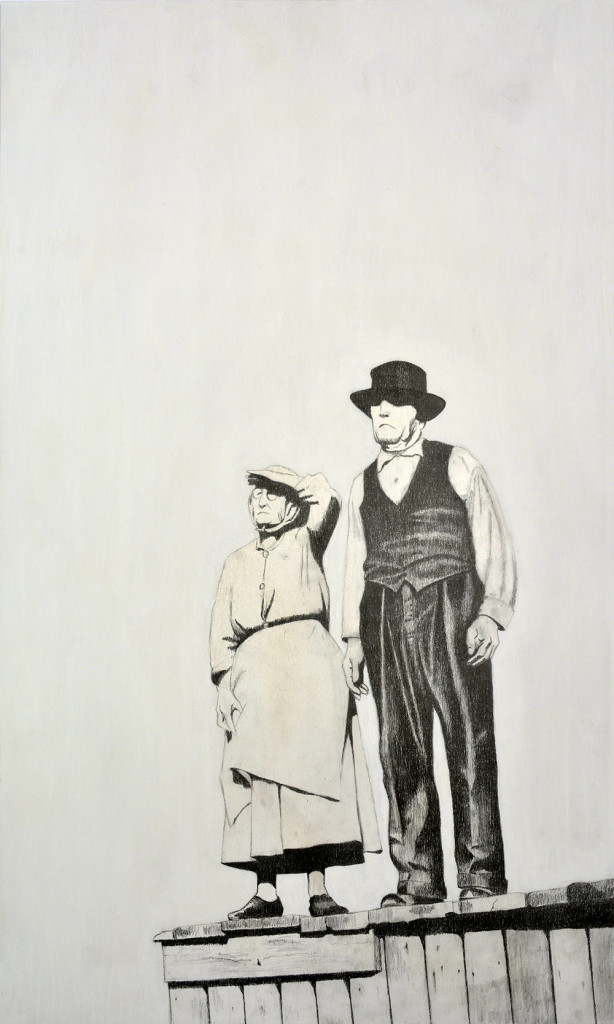 Elderly couple looking out standing on a roof